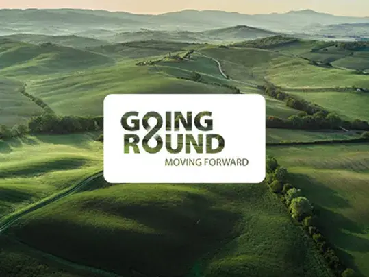 Going round moving forward logo