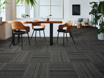 Image of Tessera Struktur 2 carpet tiles installed in a relaxed office environment