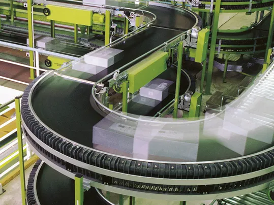 Curved conveyor in a distribution center.