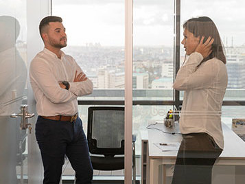 Forbo employees discussing in an office.