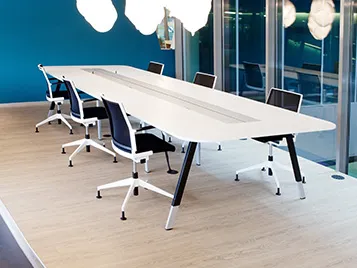Offices and public buildings: meeting room with chairs and table on bright Forbo LVT (Allura Luxury Vinyl Tiles).
