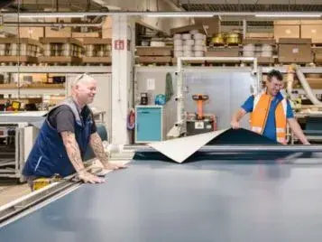 Workers in one of the Forbo fabrication centers