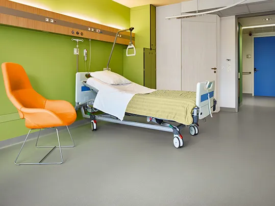 Image of Sarlon acoustic vinyl flooring installed in a hospital ward