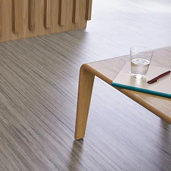 Close up image of Marmoleum Linear with a chair on it